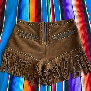 FREE PEOPLE X UNDERSTANDED FRINGE LEATHER SHORTS